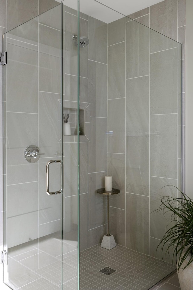 bathroom featuring a shower stall