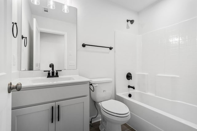 full bath with toilet, bathtub / shower combination, visible vents, and vanity