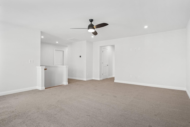 carpeted empty room with a ceiling fan, recessed lighting, and baseboards