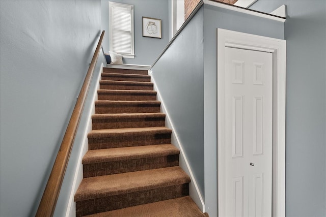 staircase with baseboards