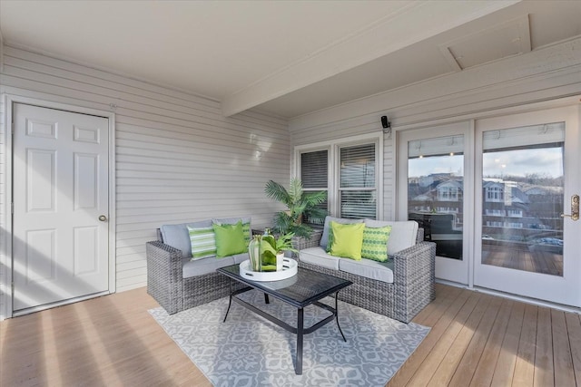 wooden deck with an outdoor hangout area