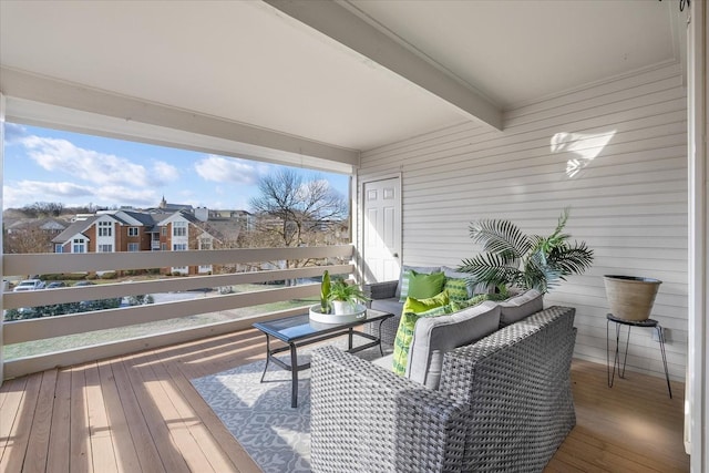 wooden deck featuring a residential view and an outdoor hangout area