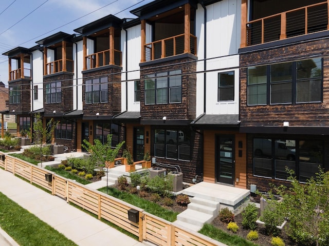 view of property featuring central AC unit