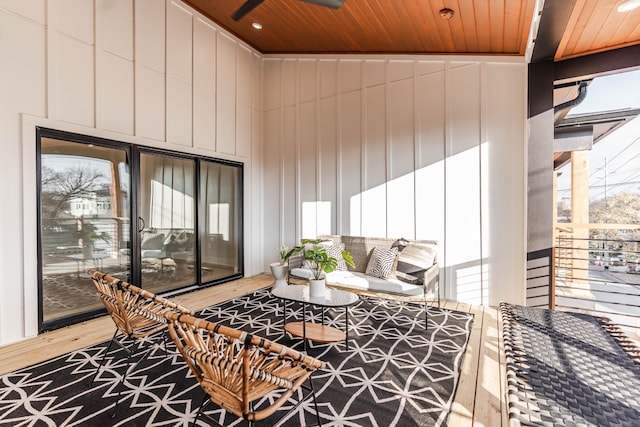 sunroom featuring wood ceiling