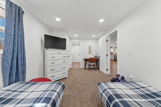 bedroom featuring carpet and recessed lighting