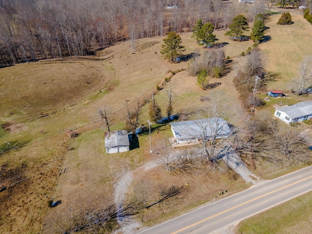 birds eye view of property featuring a rural view