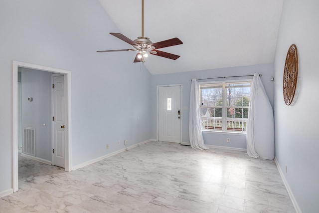 interior space with marble finish floor, baseboards, visible vents, and a ceiling fan