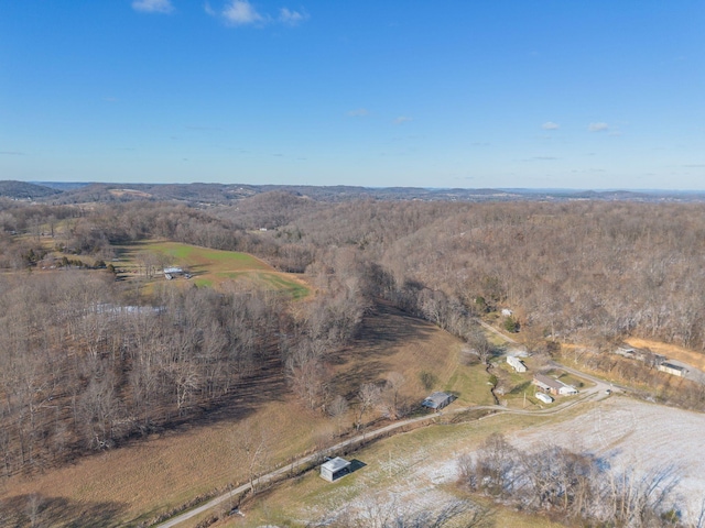 birds eye view of property with a rural view