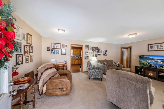 living area featuring light colored carpet