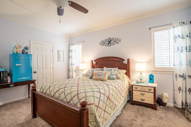 bedroom featuring baseboards, ornamental molding, a ceiling fan, and light colored carpet