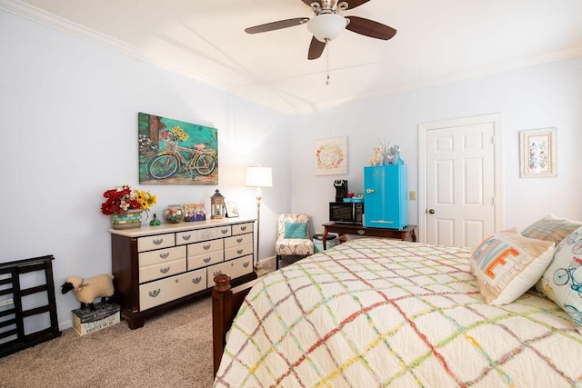 bedroom featuring ceiling fan, crown molding, and light colored carpet