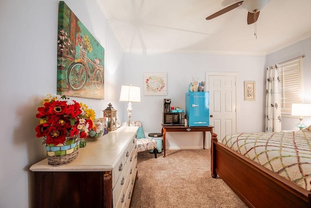 bedroom with light colored carpet, crown molding, and ceiling fan