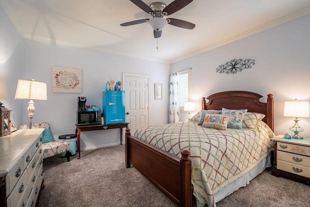 bedroom featuring baseboards, carpet floors, a ceiling fan, and crown molding