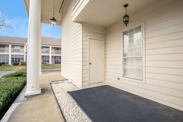 entrance to property with covered porch