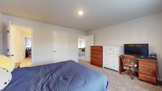 bedroom with light carpet