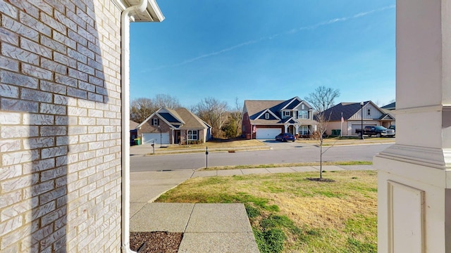 view of yard with a residential view