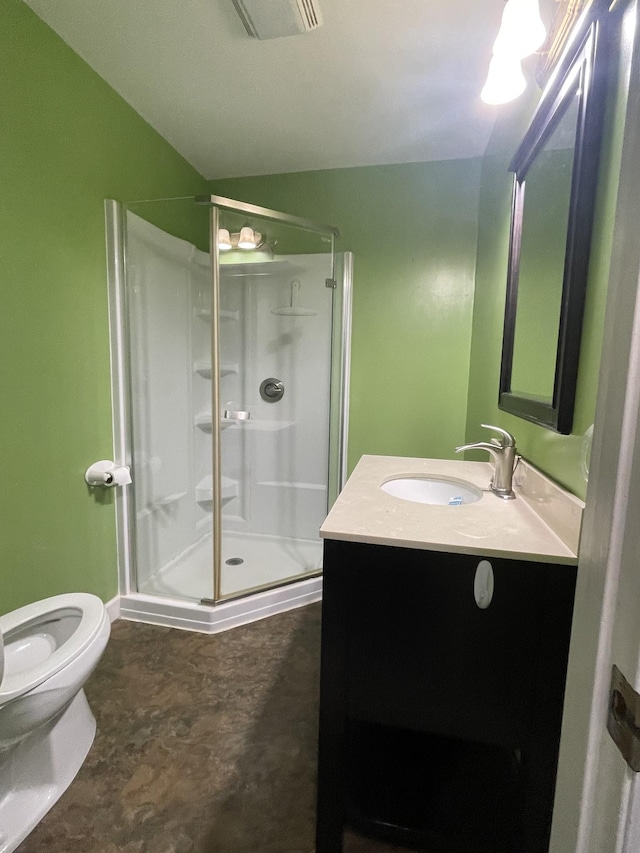 bathroom featuring toilet, a shower stall, visible vents, and vanity