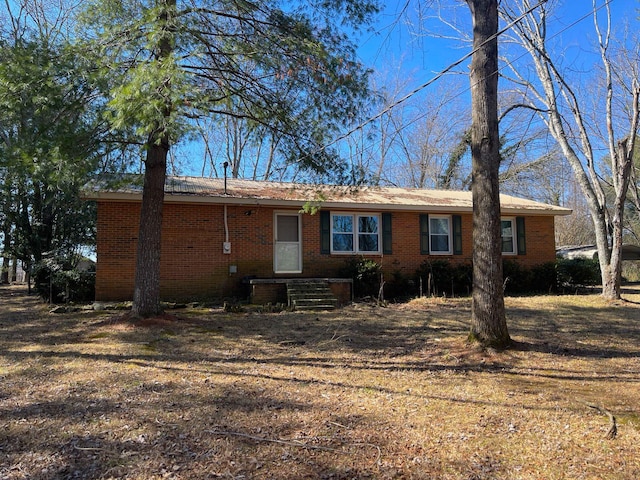view of front of property with brick siding
