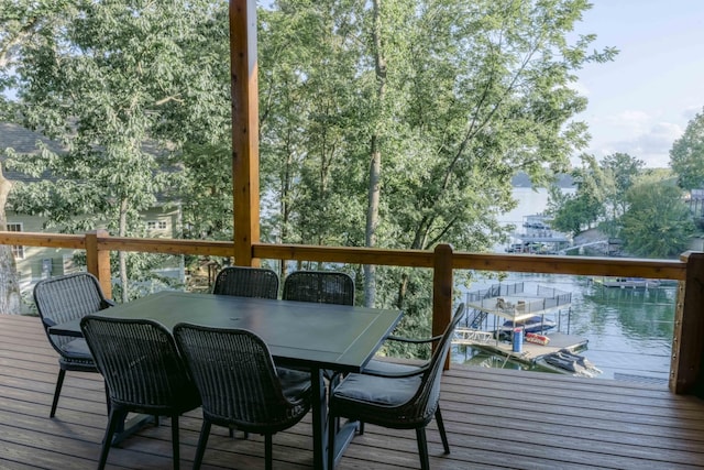 wooden terrace with a boat dock