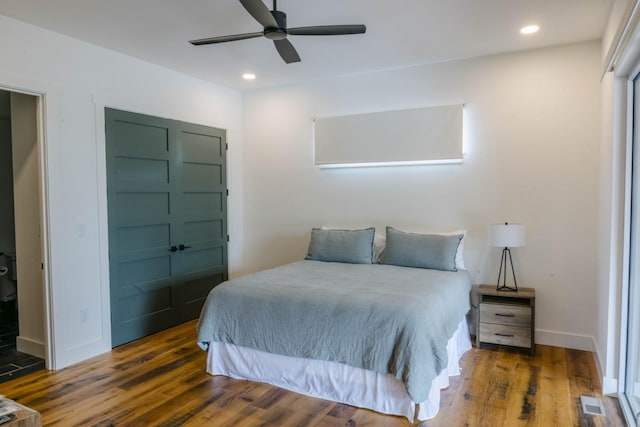 bedroom featuring a ceiling fan, baseboards, dark wood-style flooring, and recessed lighting