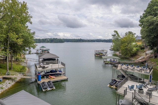 view of dock featuring a water view and boat lift