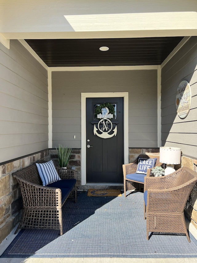 entrance to property with covered porch