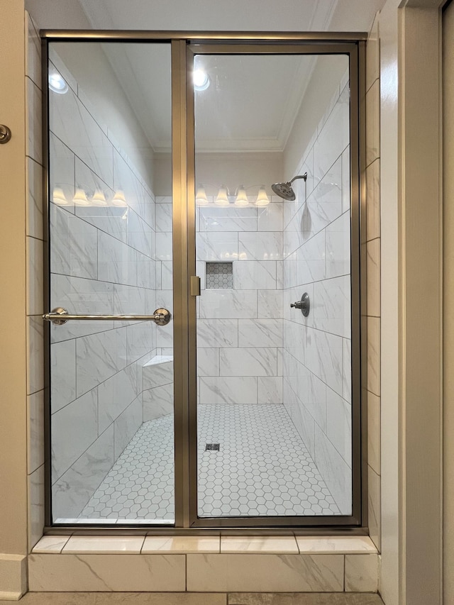 full bathroom with a shower stall and ornamental molding