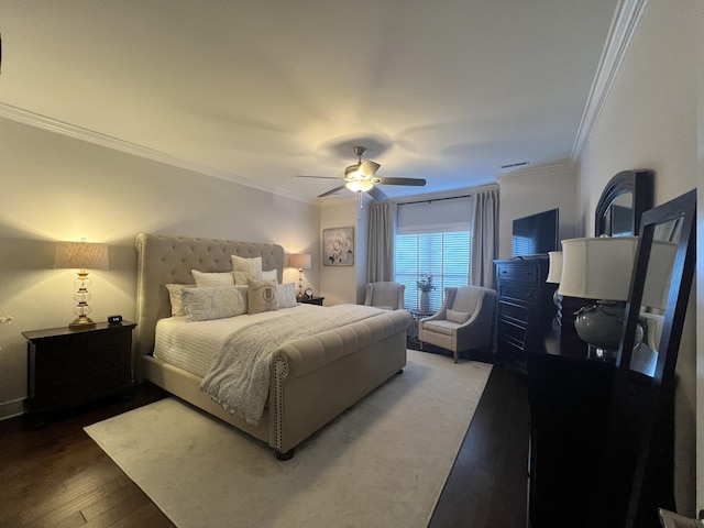 bedroom with ornamental molding, a ceiling fan, and wood finished floors