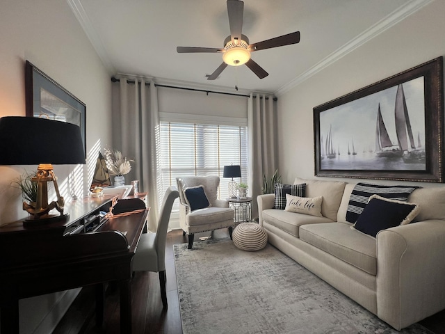 living room featuring ceiling fan, ornamental molding, and wood finished floors