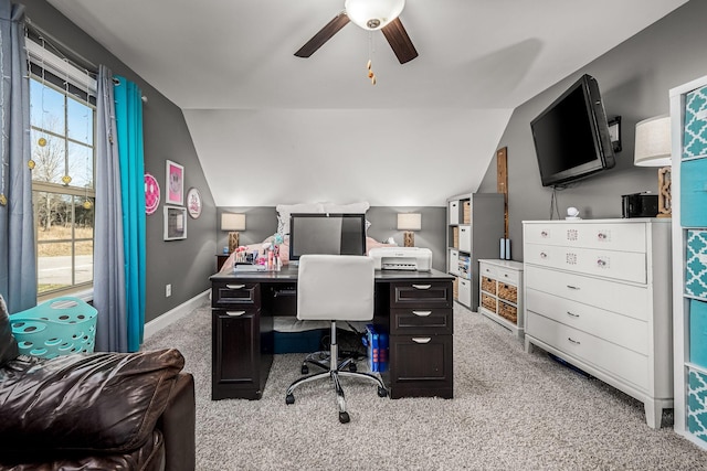 office with lofted ceiling, light carpet, ceiling fan, and baseboards