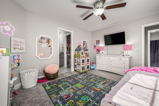 carpeted bedroom with ceiling fan and baseboards