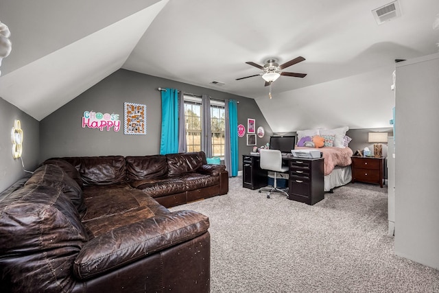 bedroom with lofted ceiling, ceiling fan, visible vents, and light colored carpet