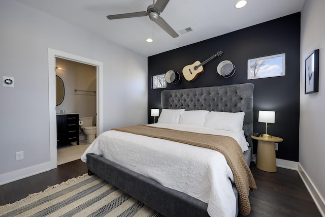 bedroom featuring baseboards, visible vents, connected bathroom, dark wood-style floors, and recessed lighting