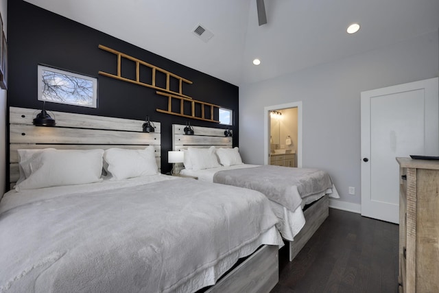 bedroom featuring baseboards, visible vents, dark wood-style flooring, ensuite bathroom, and recessed lighting