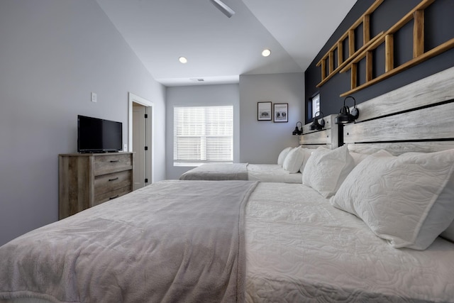 bedroom with lofted ceiling and recessed lighting