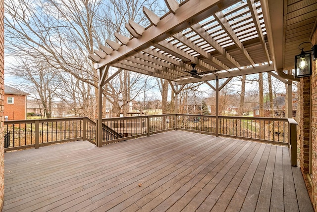 deck featuring a residential view and a pergola