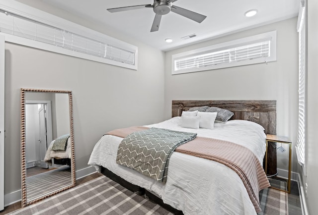 bedroom featuring baseboards, recessed lighting, visible vents, and a ceiling fan