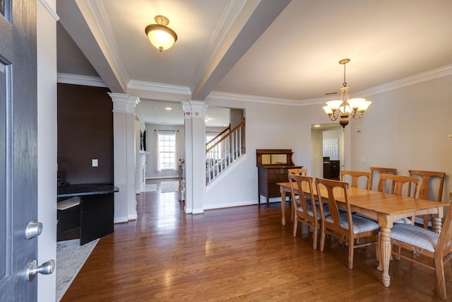 dining room with decorative columns, dark wood-type flooring, a chandelier, baseboards, and stairs