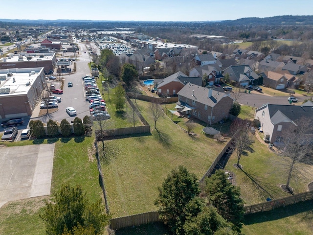 birds eye view of property with a residential view