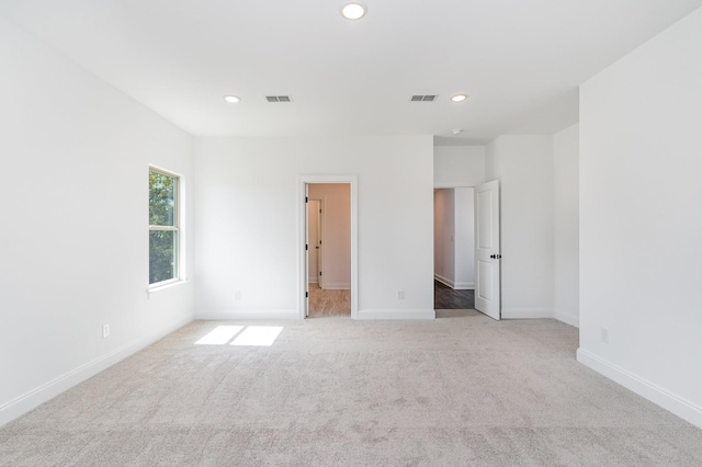 unfurnished bedroom with baseboards, carpet floors, and recessed lighting