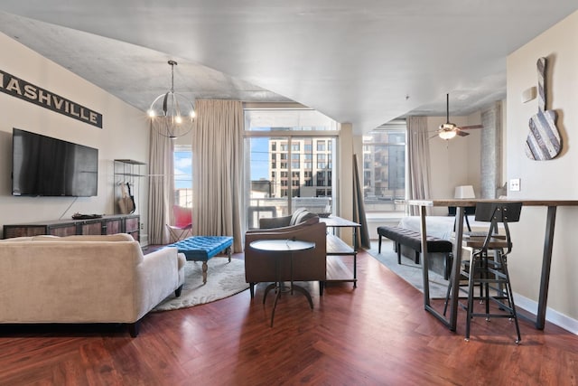 600 12th Ave S Unit 405, Nashville, TN 37203 - living room featuring parquet floors, baseboards, and ceiling fan with notable chandelier