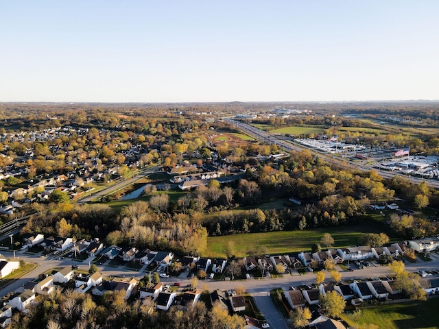 birds eye view of property with a residential view