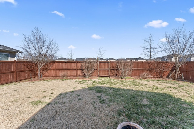 view of yard featuring a fenced backyard