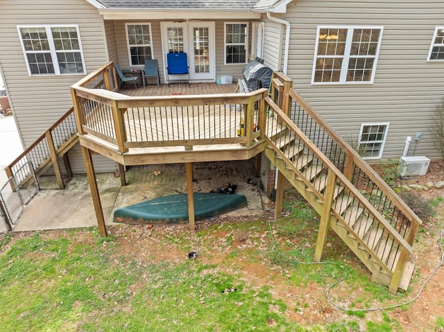 deck featuring stairway and area for grilling