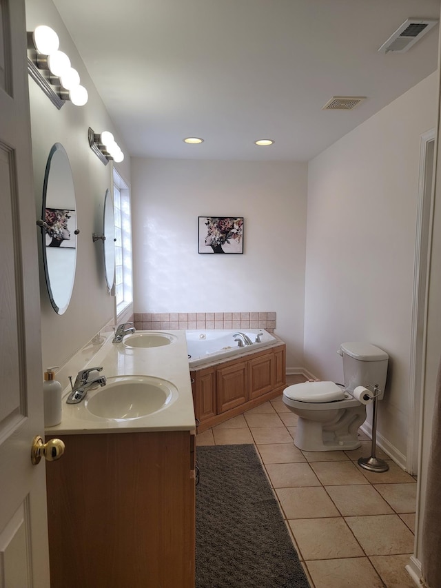 full bathroom with visible vents, a sink, and tile patterned floors