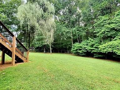 view of yard featuring stairs