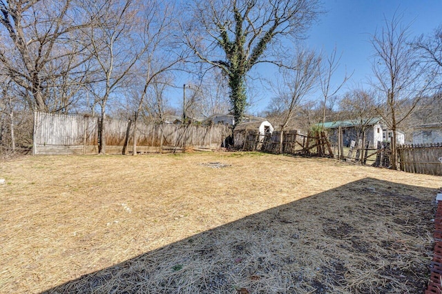 view of yard featuring a fenced backyard