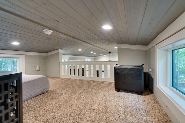 interior space featuring recessed lighting, wooden ceiling, carpet flooring, and lofted ceiling