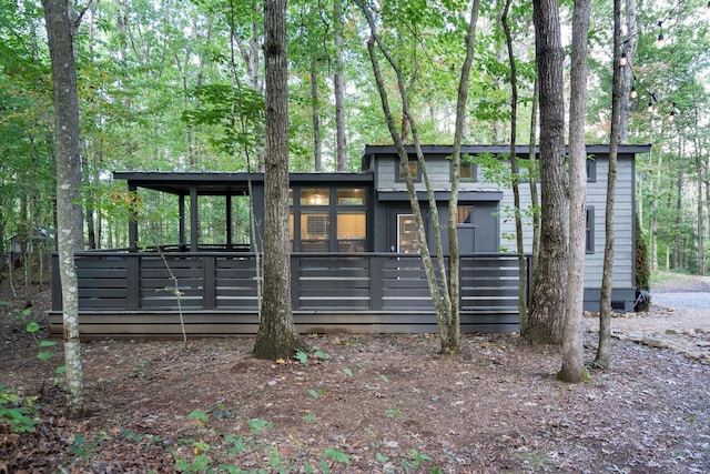 view of front of house with a sunroom