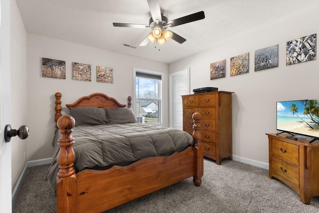 bedroom with light carpet, baseboards, visible vents, and ceiling fan